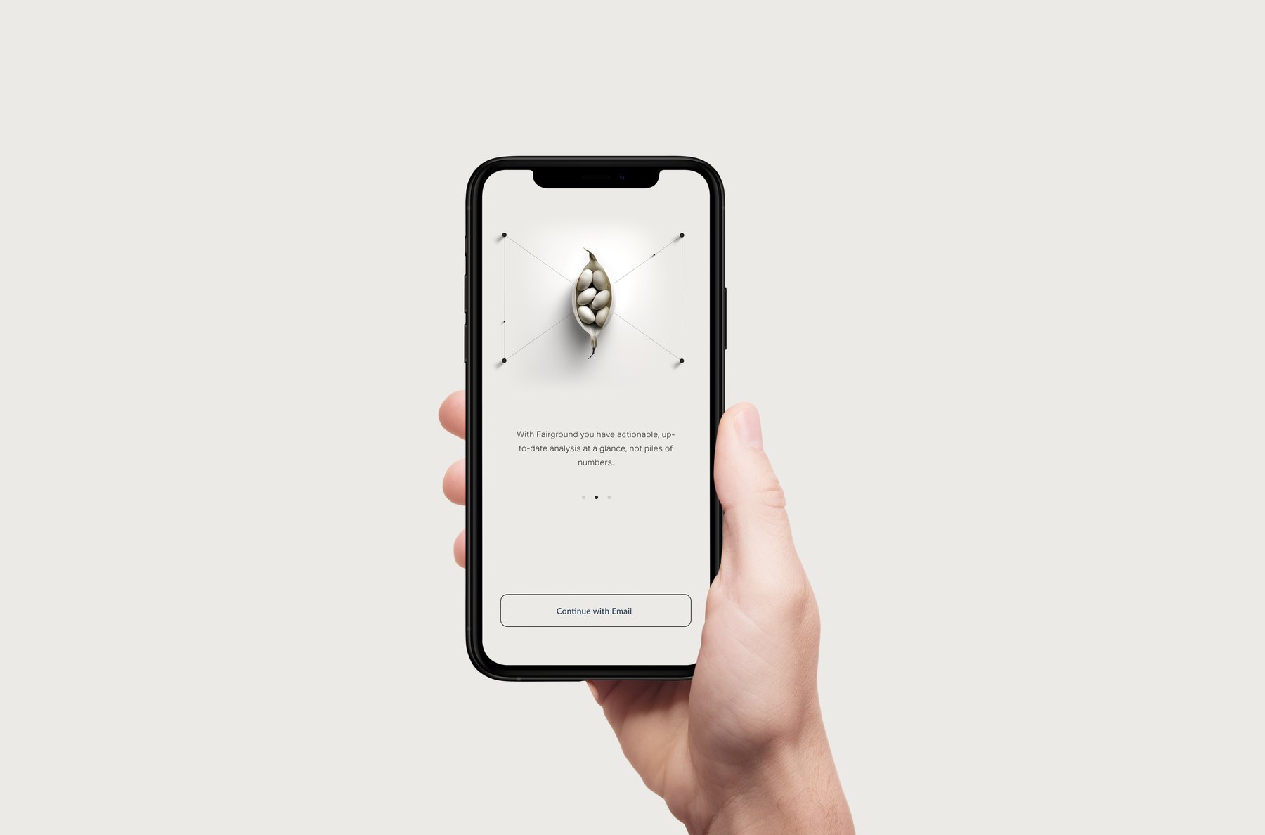 A second phone onboarding screen: a seed pod inside a hairline X with a dot at each of the four ends, and the second page indicator dot now filled.